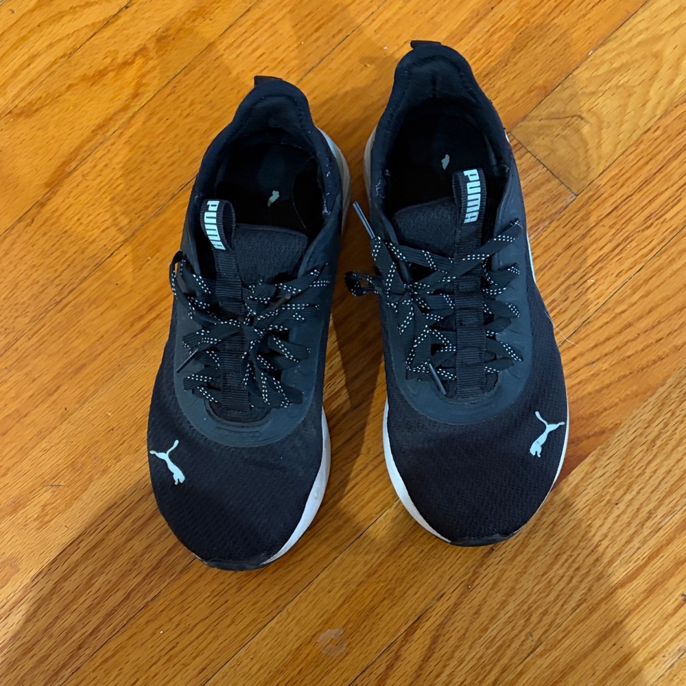 Puma women’s  Black and White Sneakers